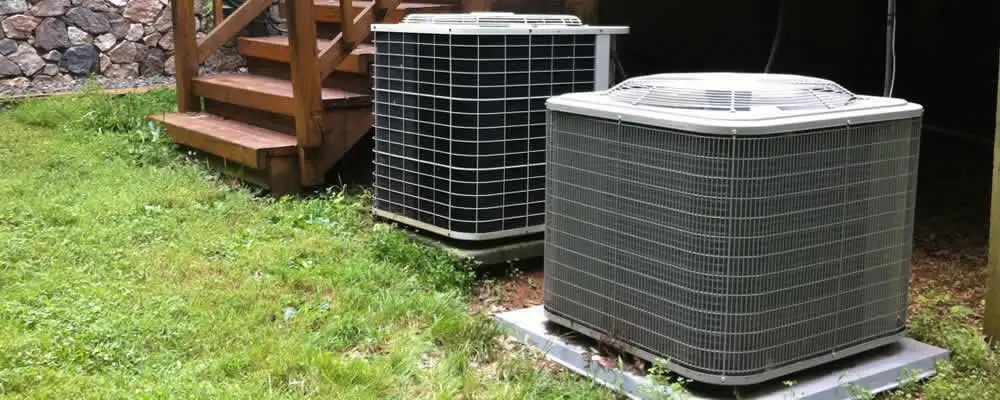 Heat pump installation and service units outside a home in Houston, TX